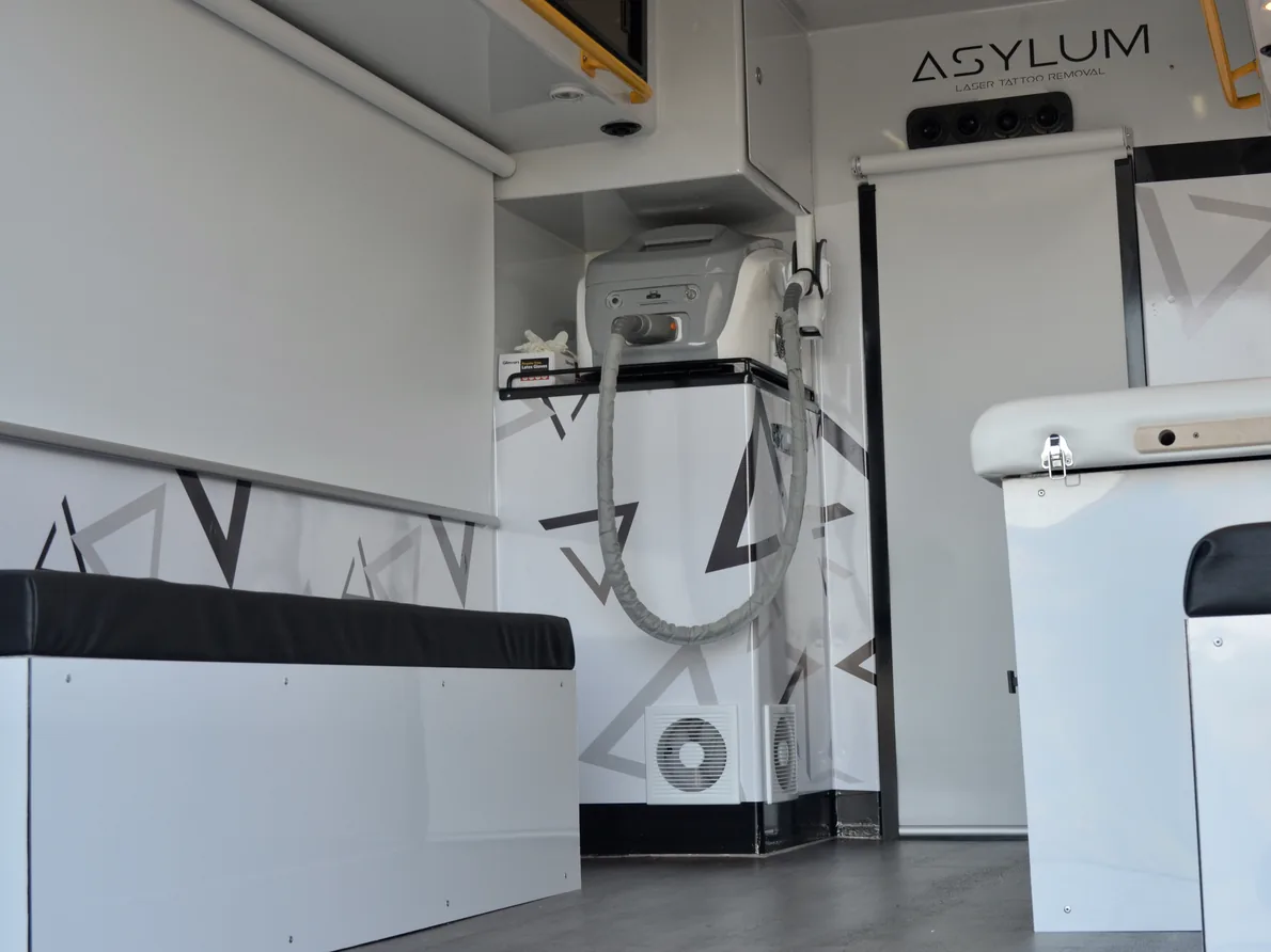 Inside the Asylum ambulance: a compact treatment space with a laser system and treatment couch